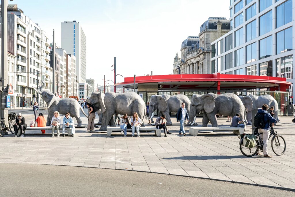 Model elephants march through Antwerp in scenic parade
