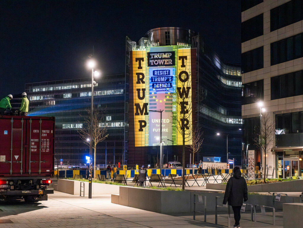Greenpeace activists target EU summit with 'Trump Tower' projection on the Berlaymont building