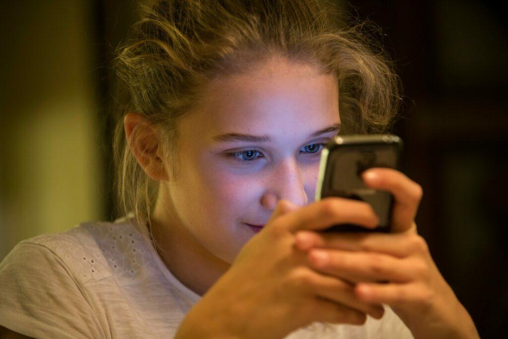 How would Belgium enforce a social media ban on young people and is it working elsewhere?